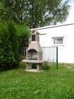 Zvíkov s fasádou Marmolit,odstín 038,úprava hladká.s udírničkou v komínš.